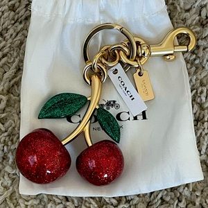 Coach cherry key charm